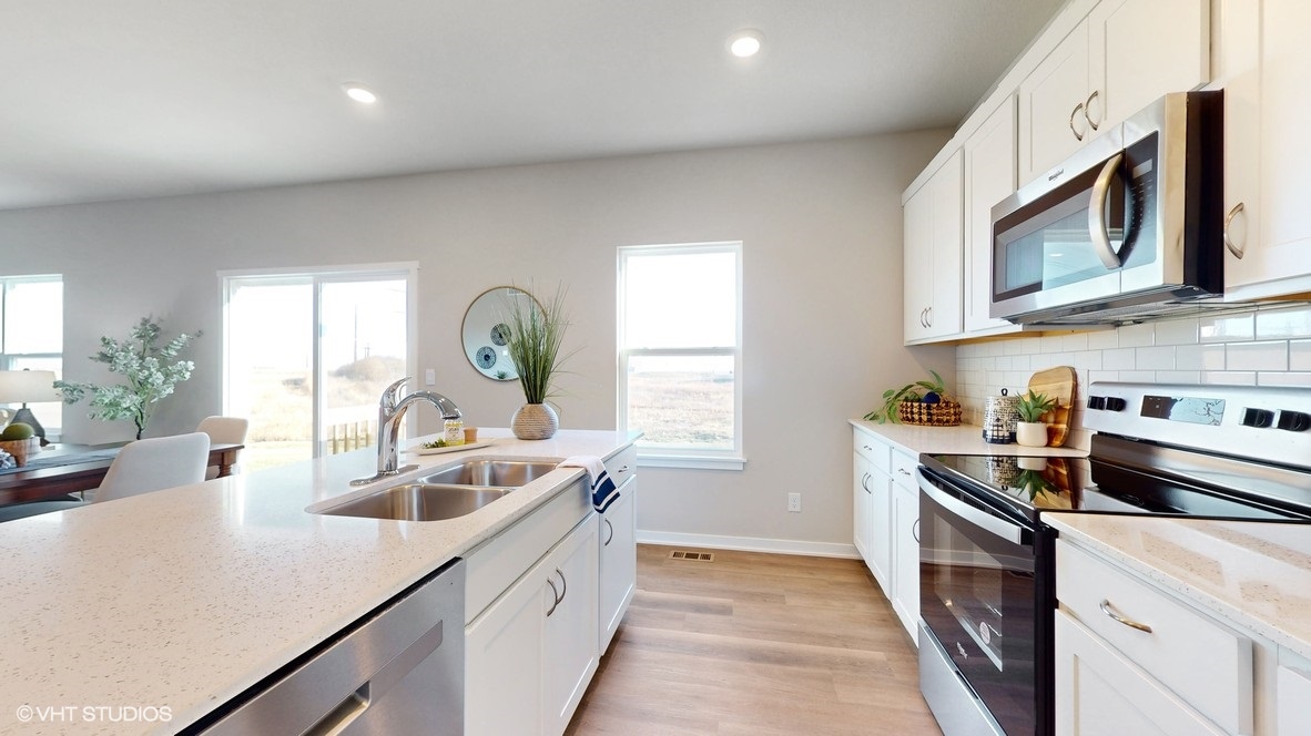 modern kitchen with stainless-steel appliances