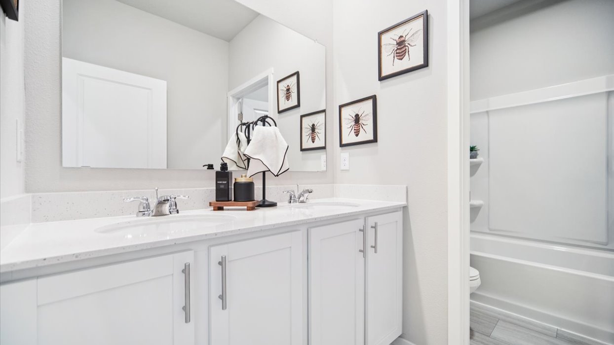 Alternate view of family full bathroom 2 highlighting layout and shared access. Edgewood Trail