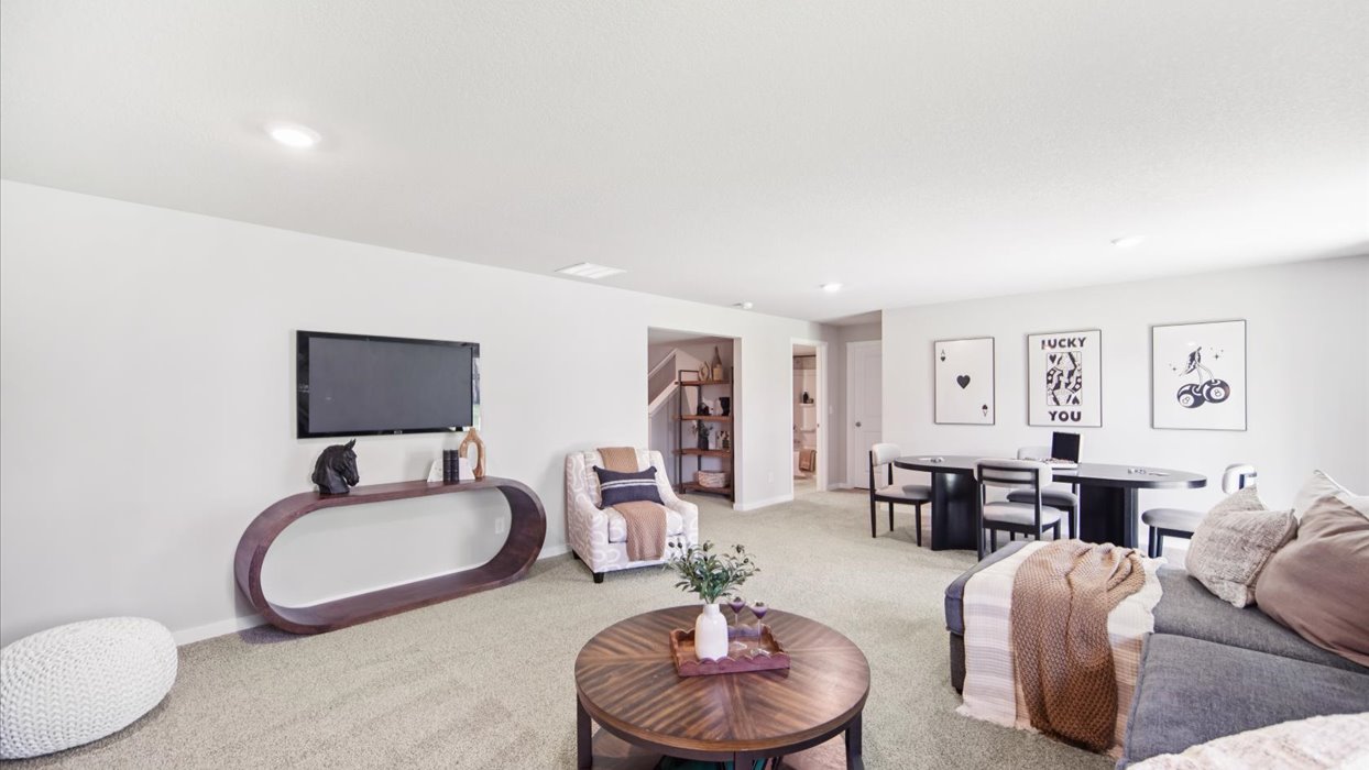 Game room loft space offering flexible use for entertainment, work, or relaxation.