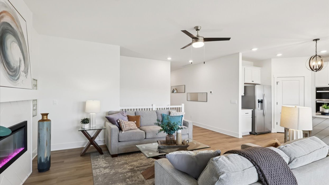 Open concept living room with electric fireplace