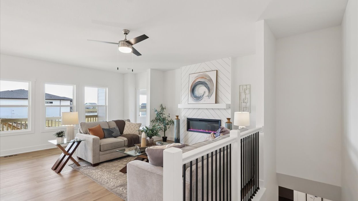 Open concept living room with electric fireplace