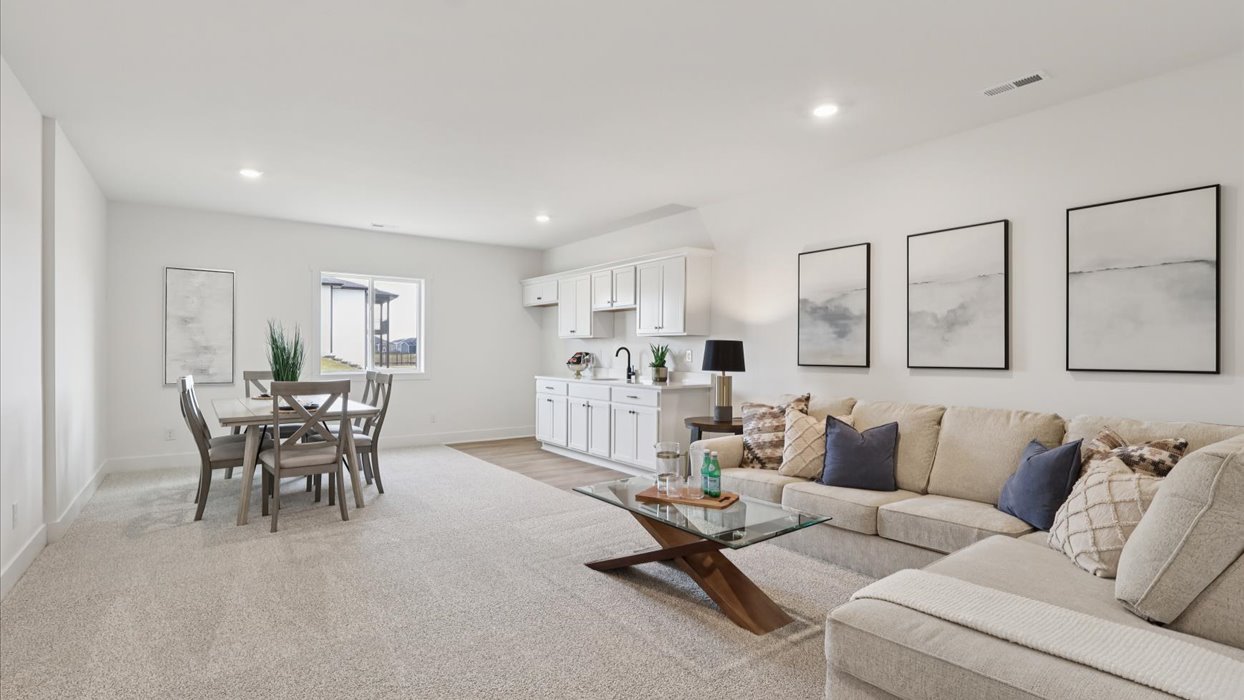 fairfield finished basement with large grey couch