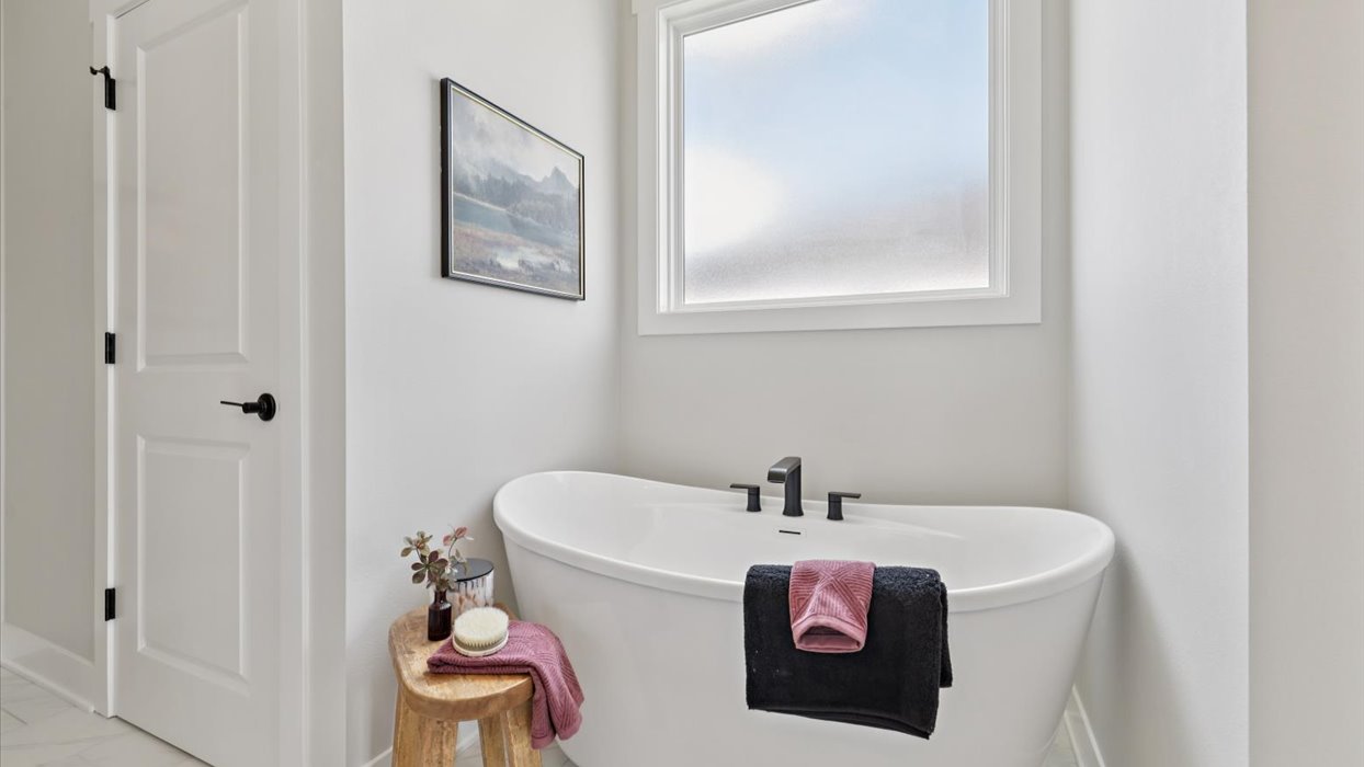 large soaker tub in primary bathroom
