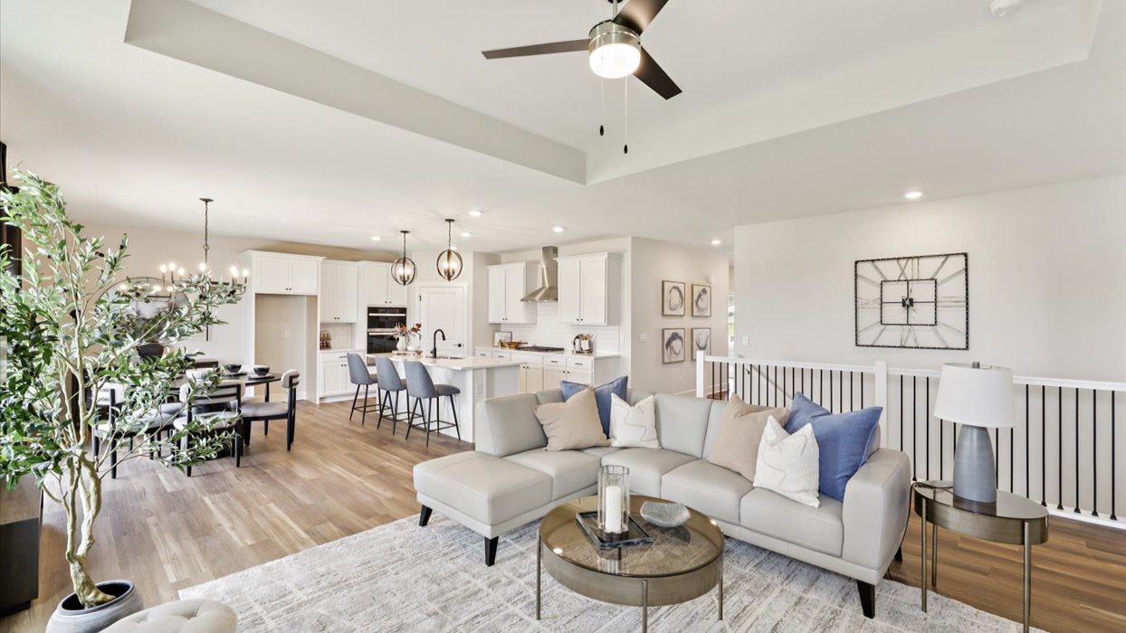 living room with view of dining area and kitchen