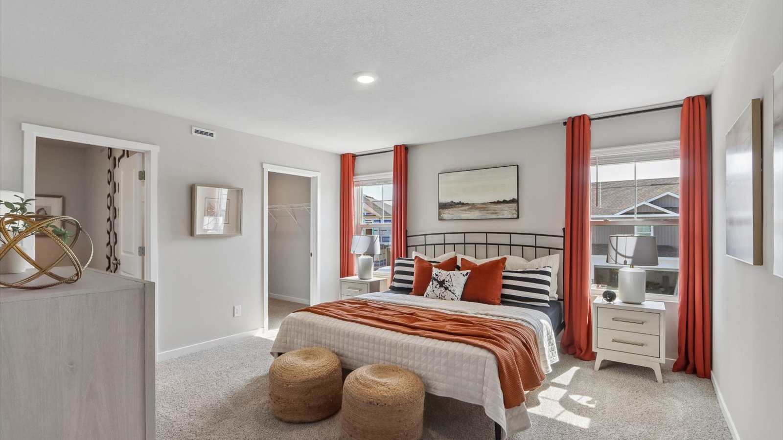 Primary bedroom with natural lighting and spacious layout