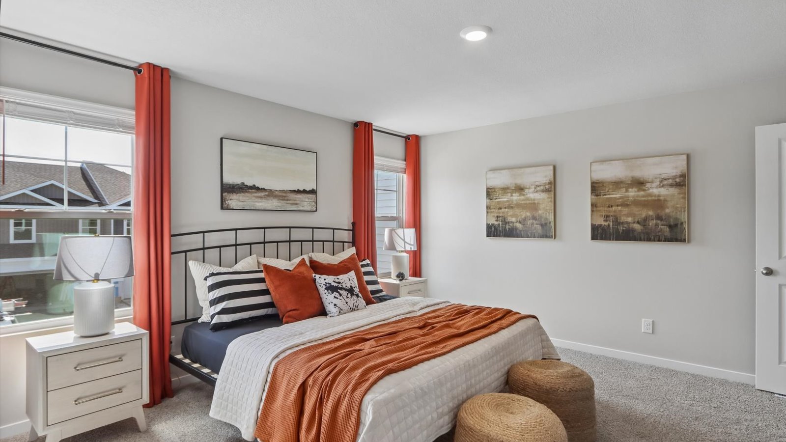 Primary bedroom with natural lighting and spacious layout