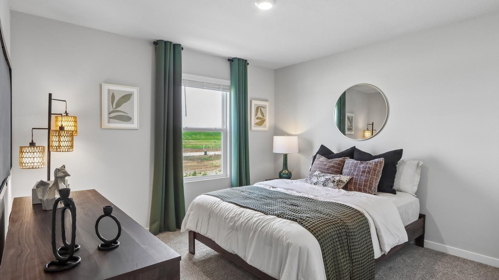 Comfortable secondary bedroom with natural light, modern finishes, and versatile living space.