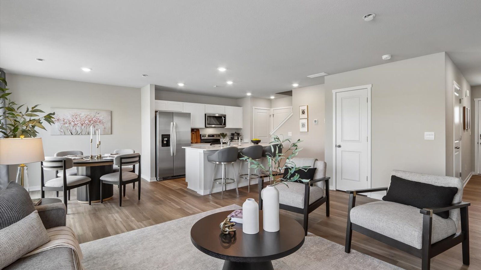 Open concept living room with electric fireplace