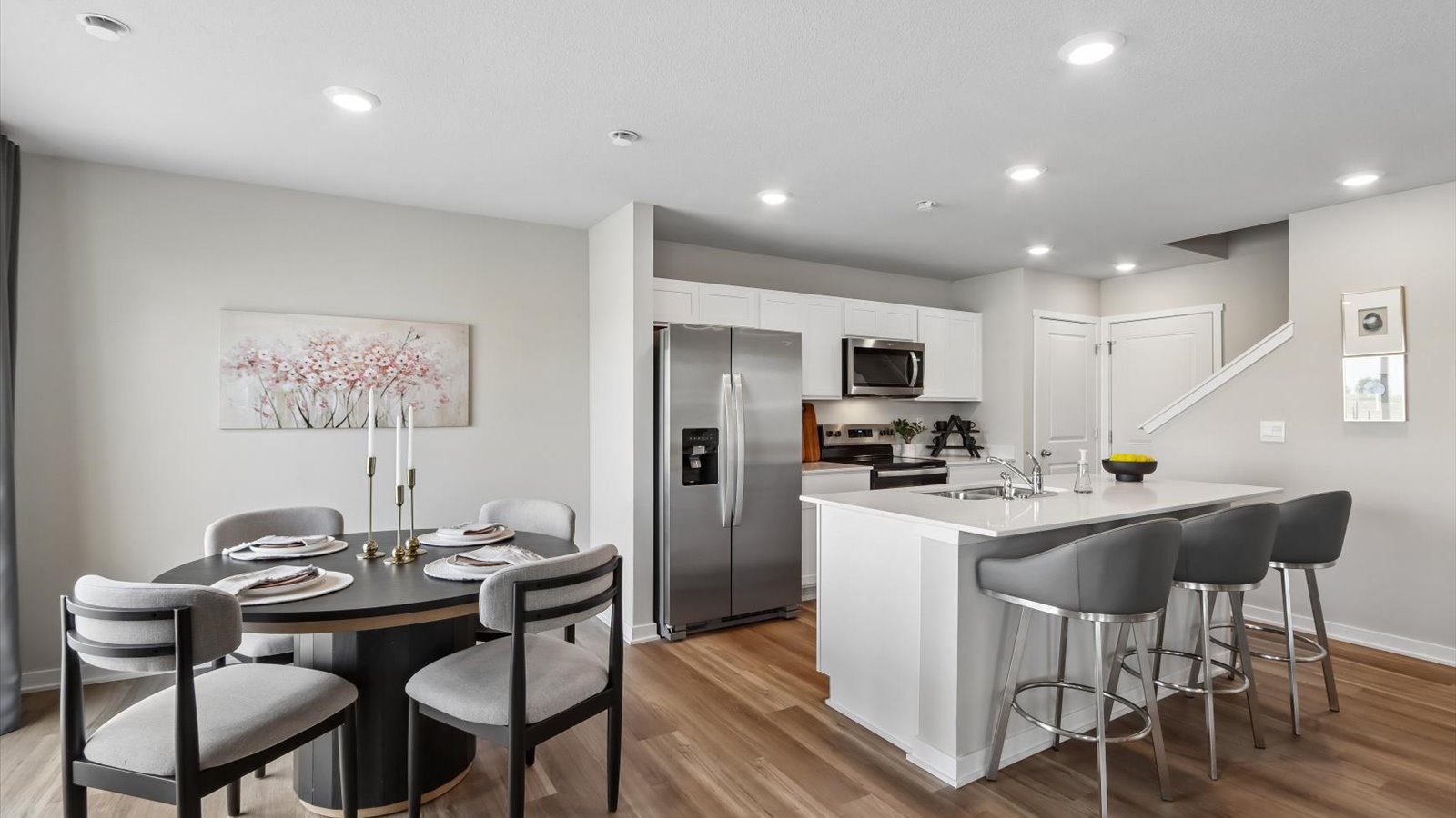 Kitchen with white cabinetry and quartz countertop
