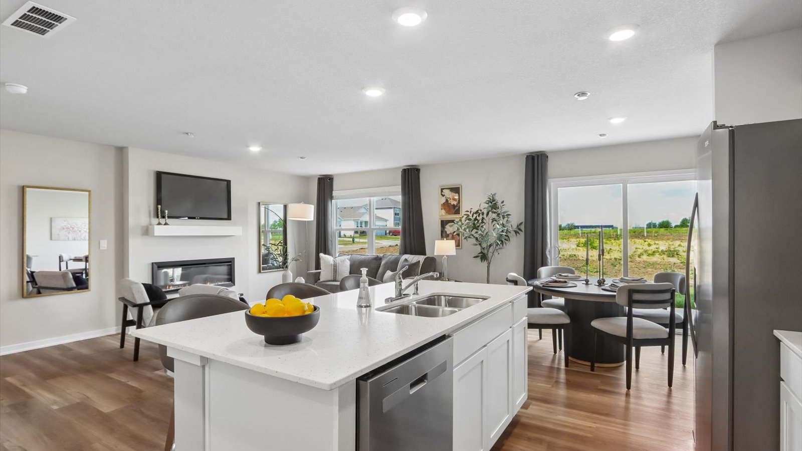 Kitchen with white cabinetry and quartz countertop