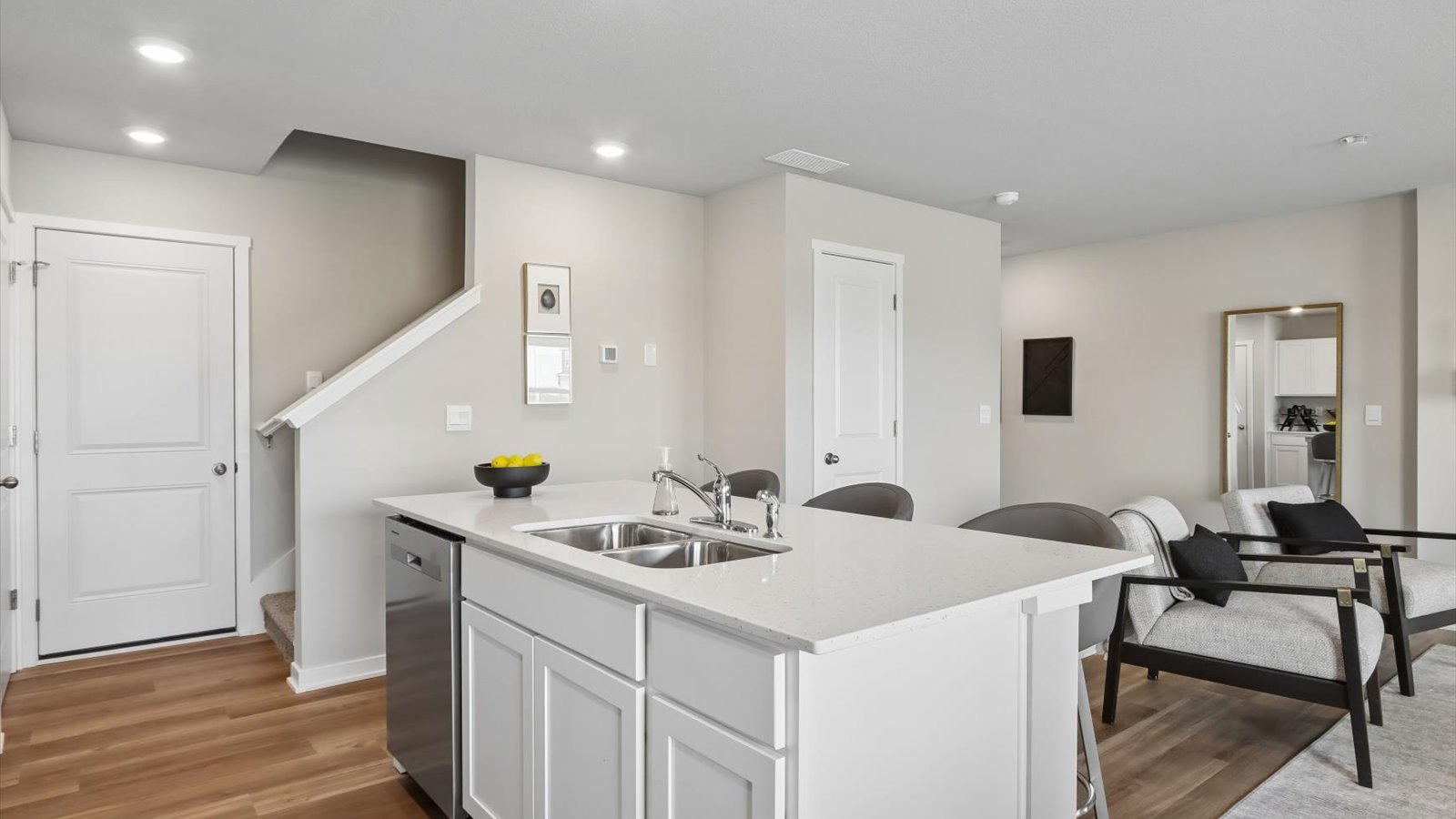 Kitchen with white cabinetry and quartz countertop