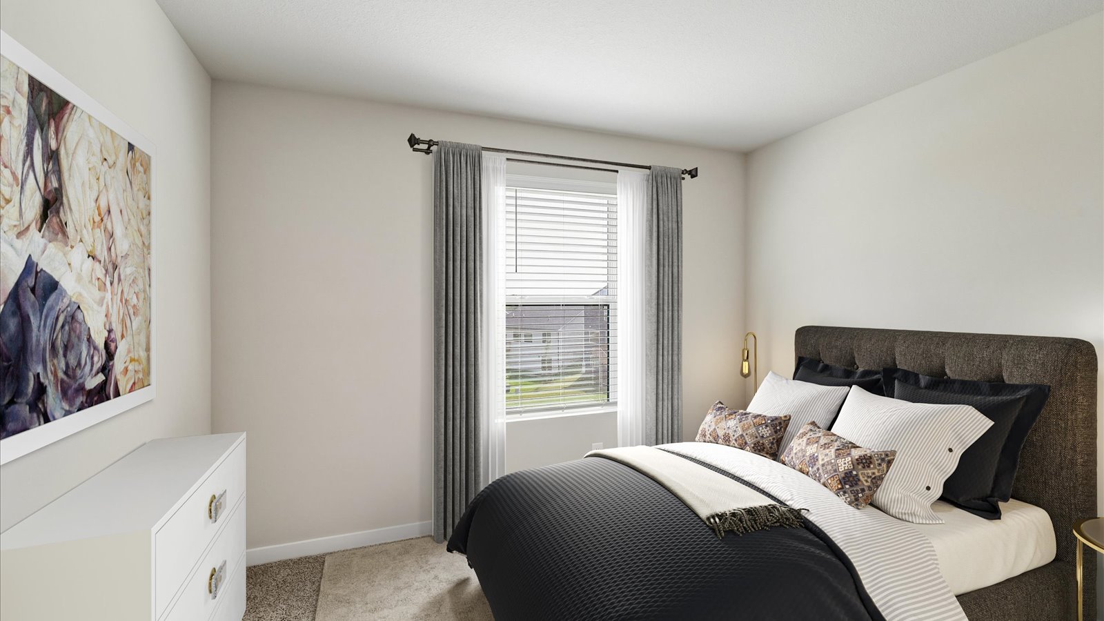 Comfortable secondary bedroom with natural light, modern finishes, and versatile living space.