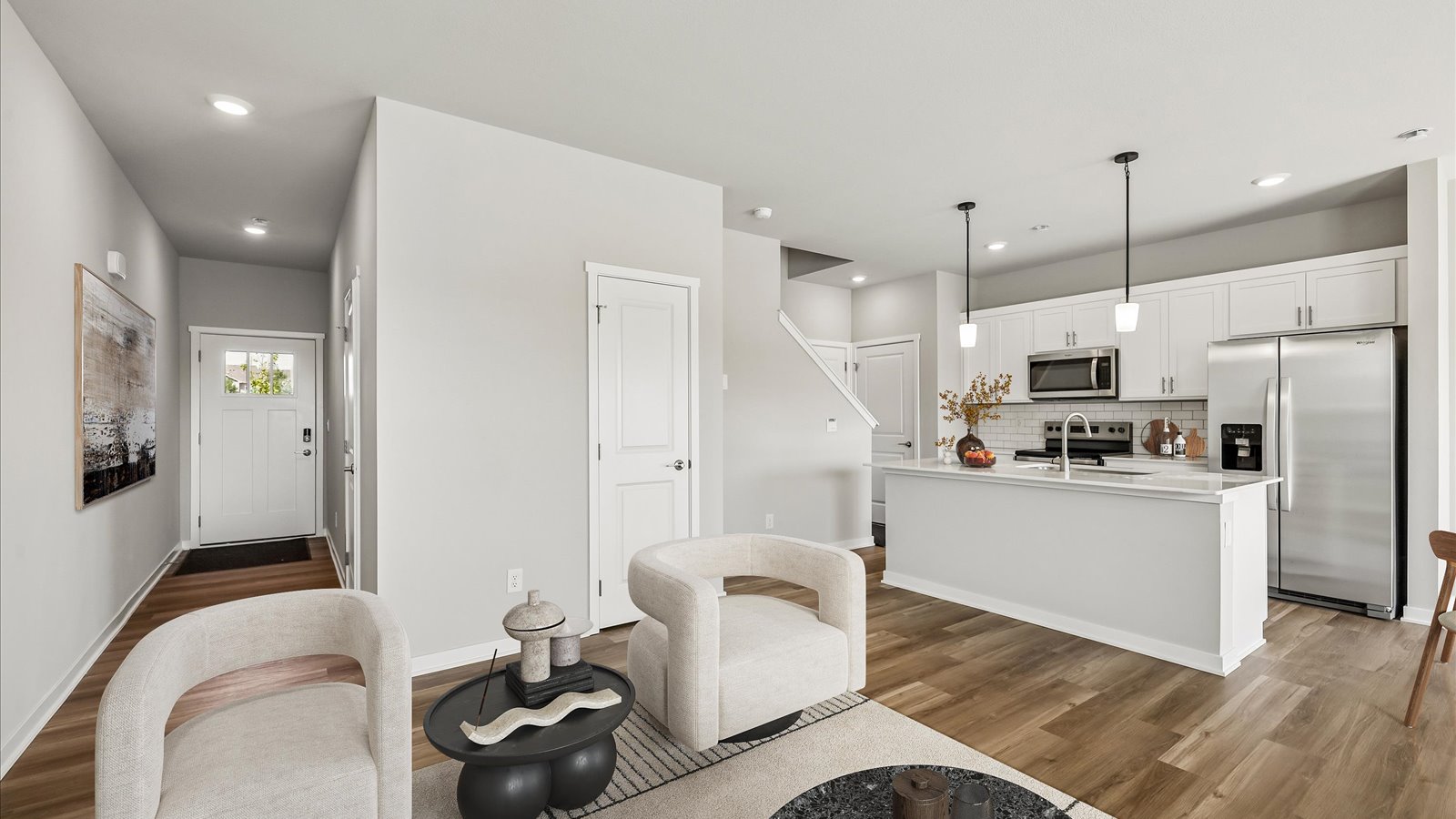 Open concept living room with electric fireplace