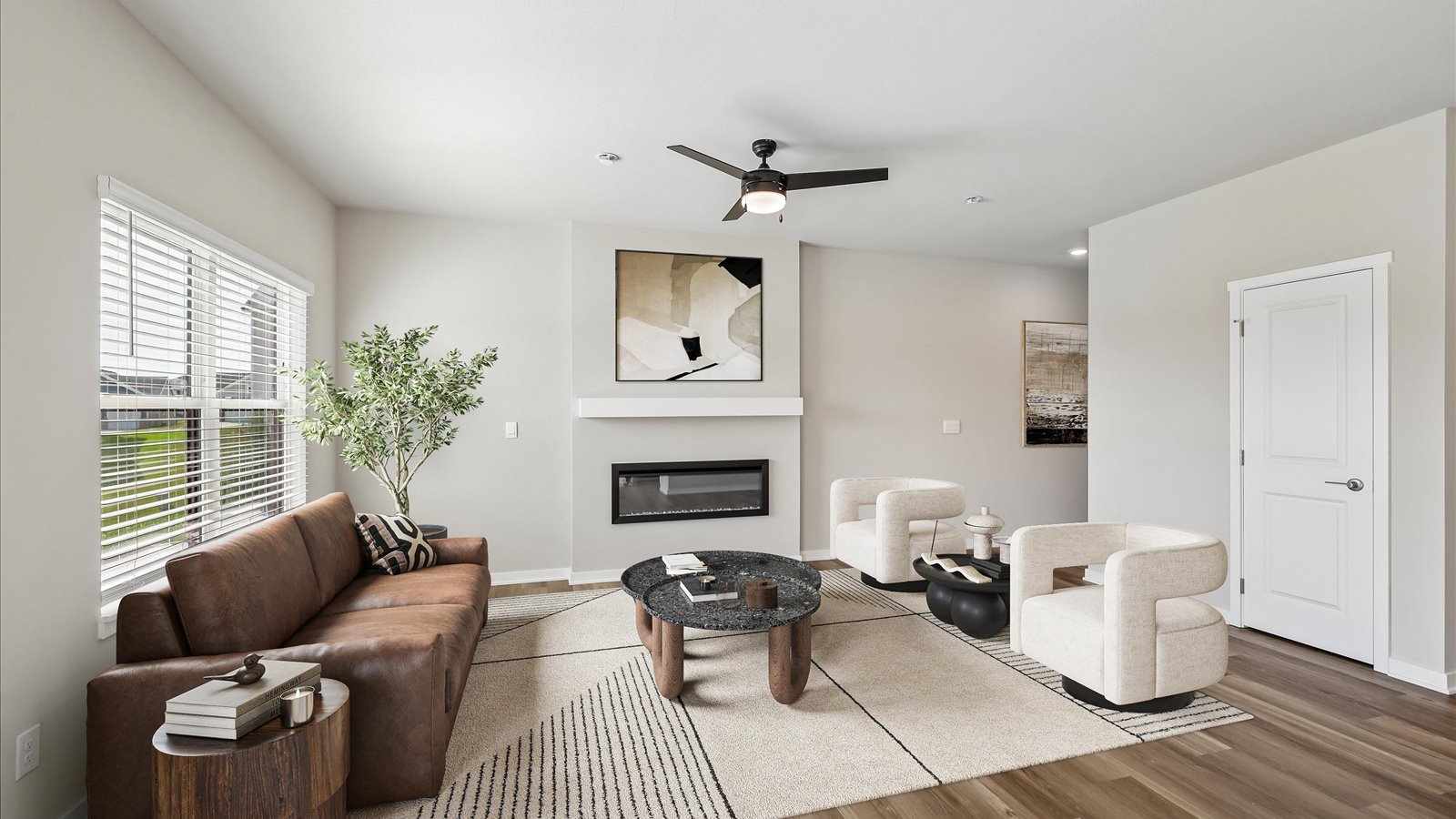 Open concept living room with electric fireplace