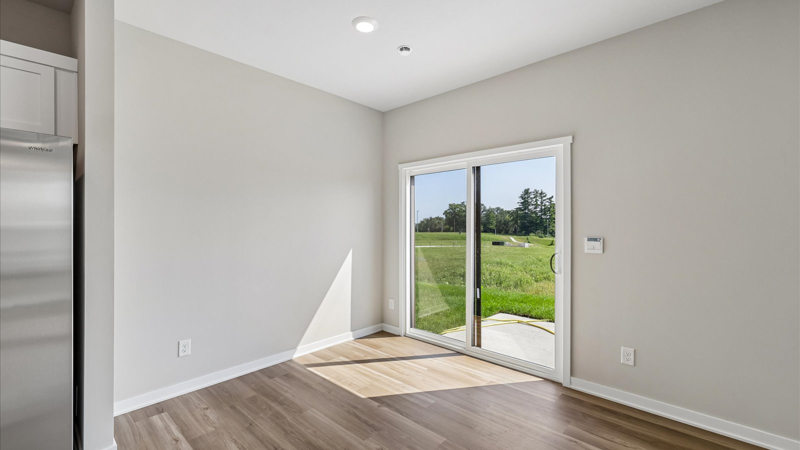 Open concept living room with electric fireplace