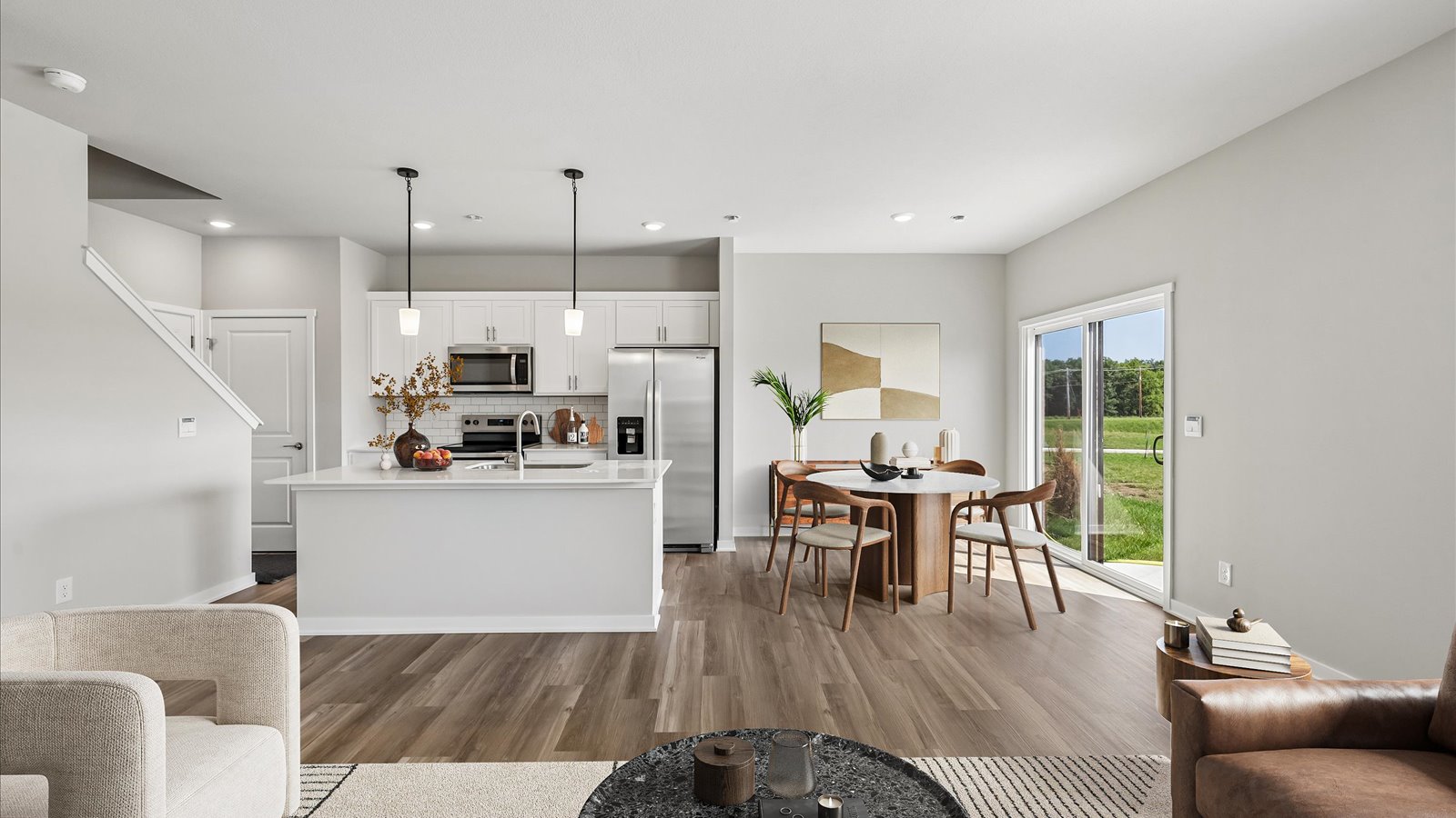 Open concept living room with electric fireplace