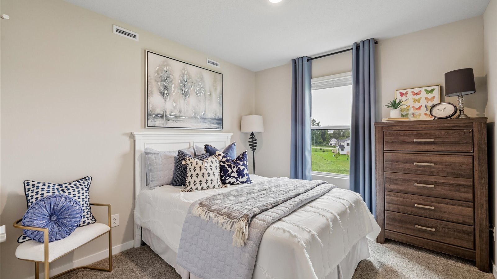 Comfortable secondary bedroom with natural light, modern finishes, and versatile living space.