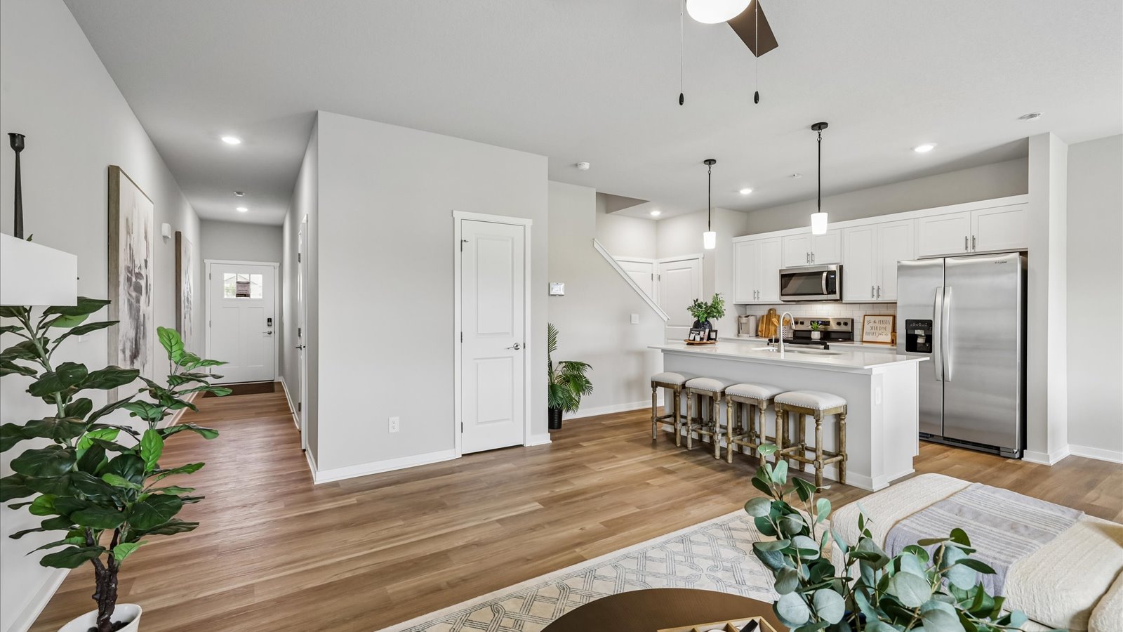 Open concept living room with electric fireplace