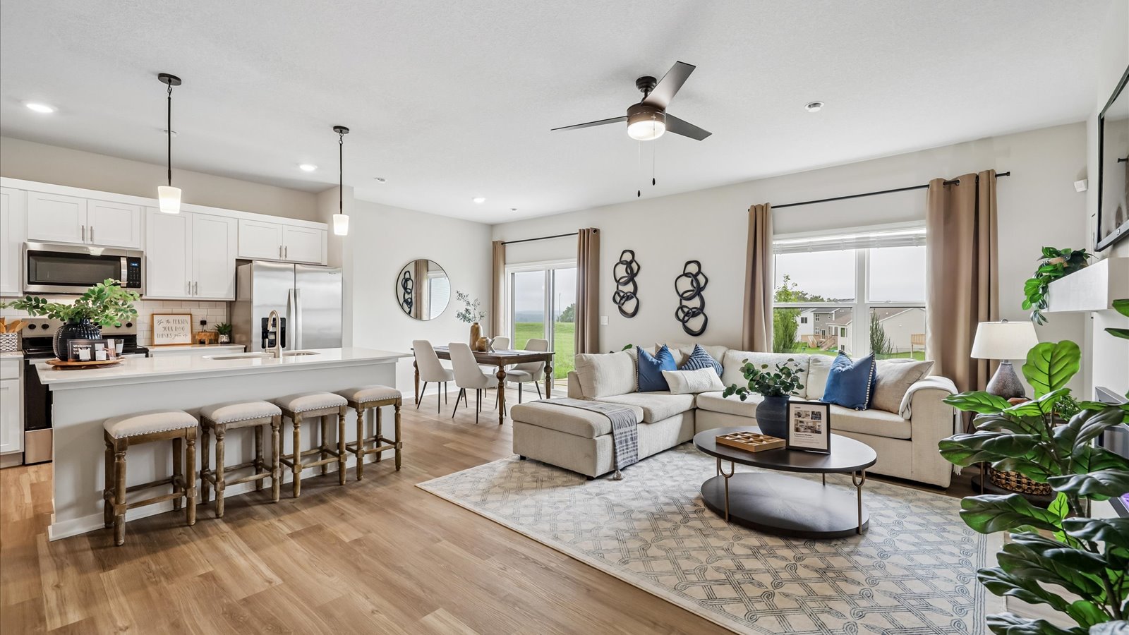 Open concept living room with electric fireplace
