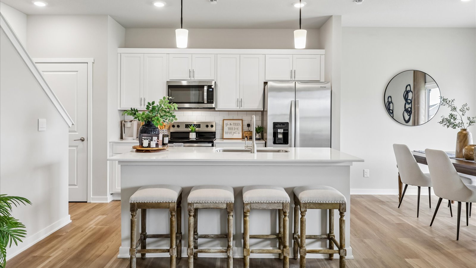 Kitchen with white cabinetry and quartz countertop