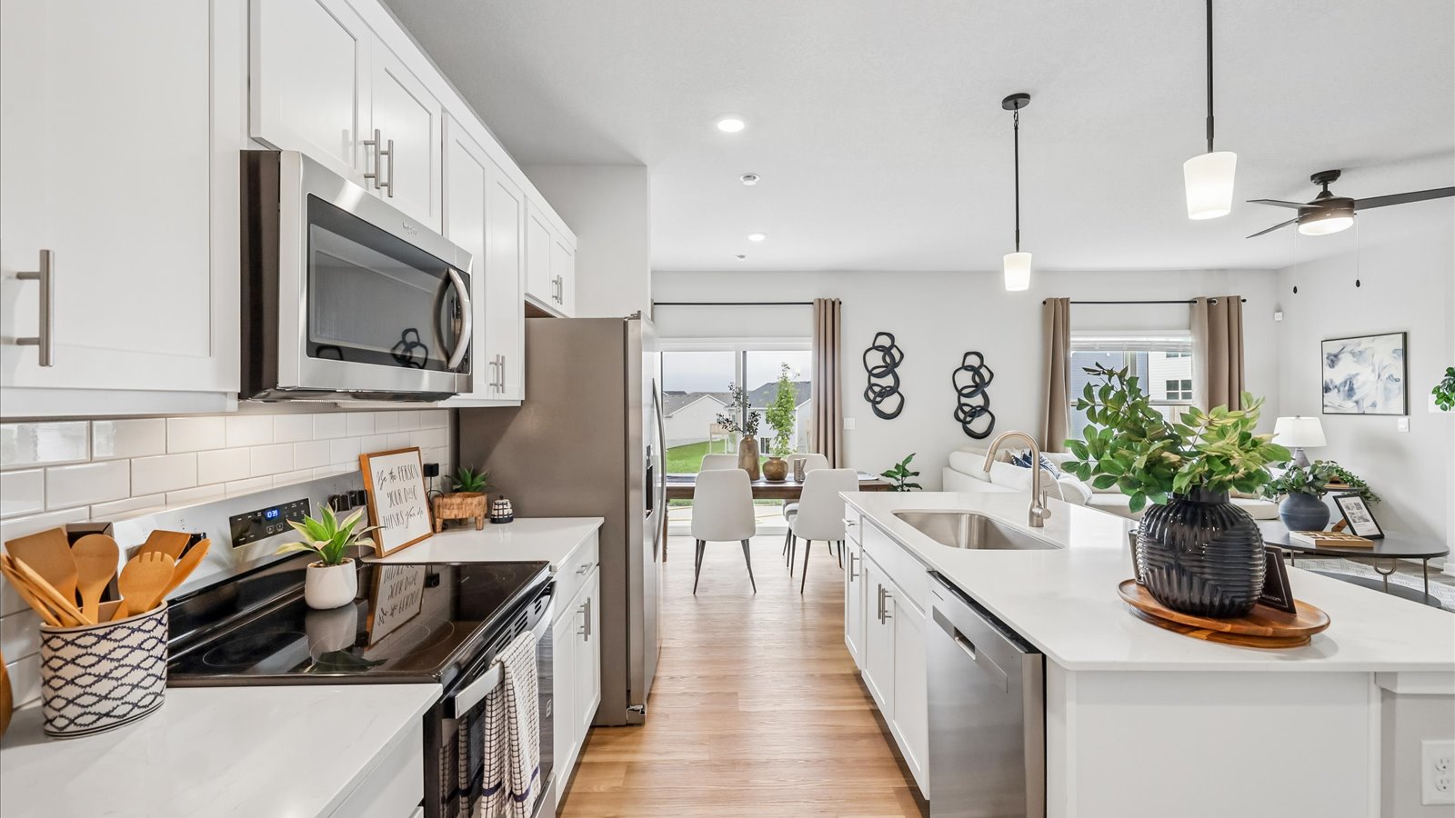 Kitchen with white cabinetry and quartz countertop