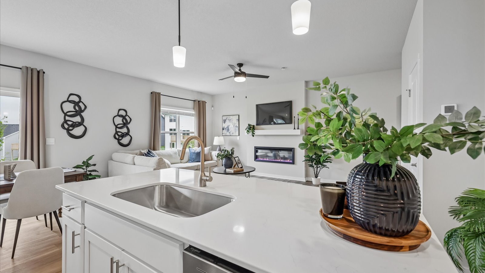 Kitchen with white cabinetry and quartz countertop