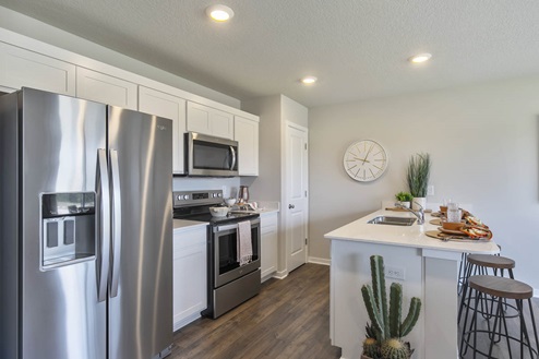 modern kitchen with stainless-steel appliances