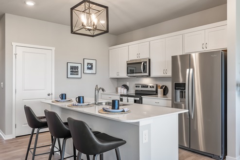 Kitchen island wirh stainless-steel appliances