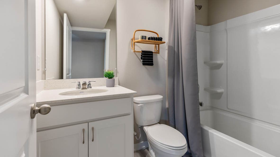 Second bathroom with shower and bathtub