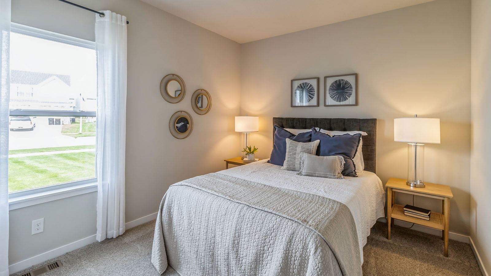 Third bedroom with window and bed
