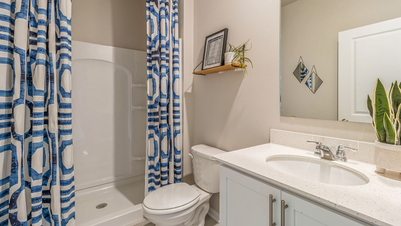 Third bathroom with sink and bathtub