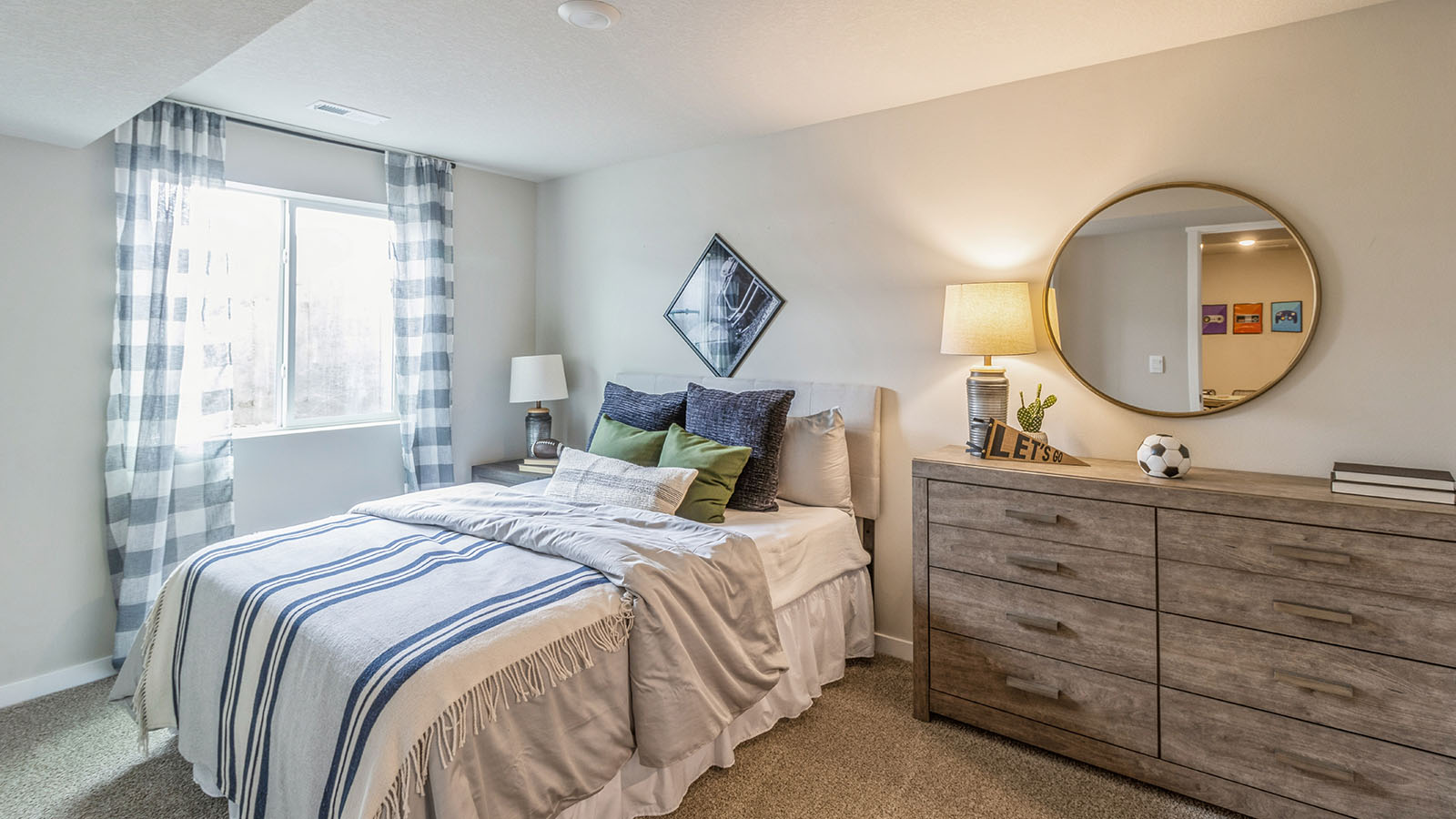 Fourth bedroom with egress window and overhead lighting