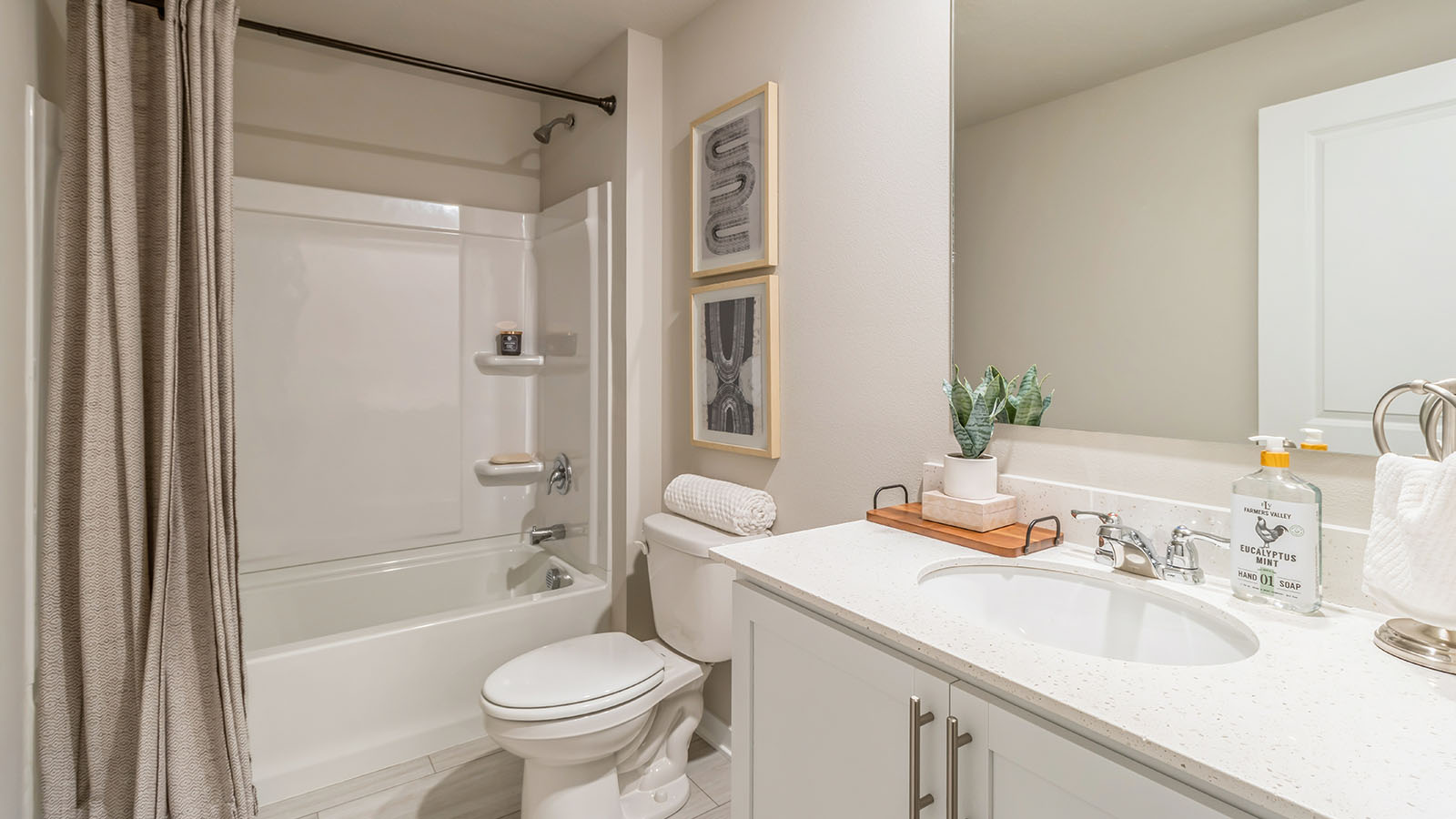 Fourth bathroom with shower and bathtub