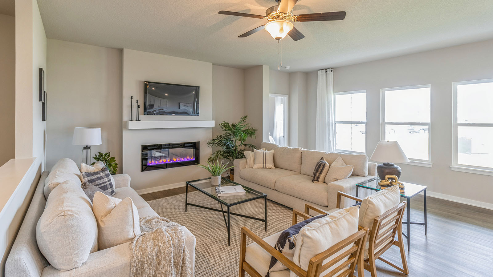 - Bright living room with three windows for natural lighting