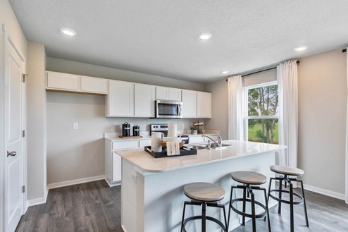 White kitchen with small window