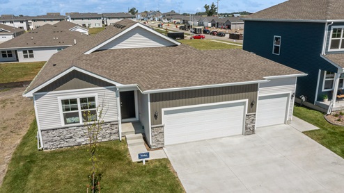 Exterior photo of the Hamilton in Canyon Landing with a 3 car-garage