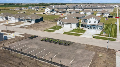 Parking lot view of the Bellhaven and Hamilton models in Canyon Landing