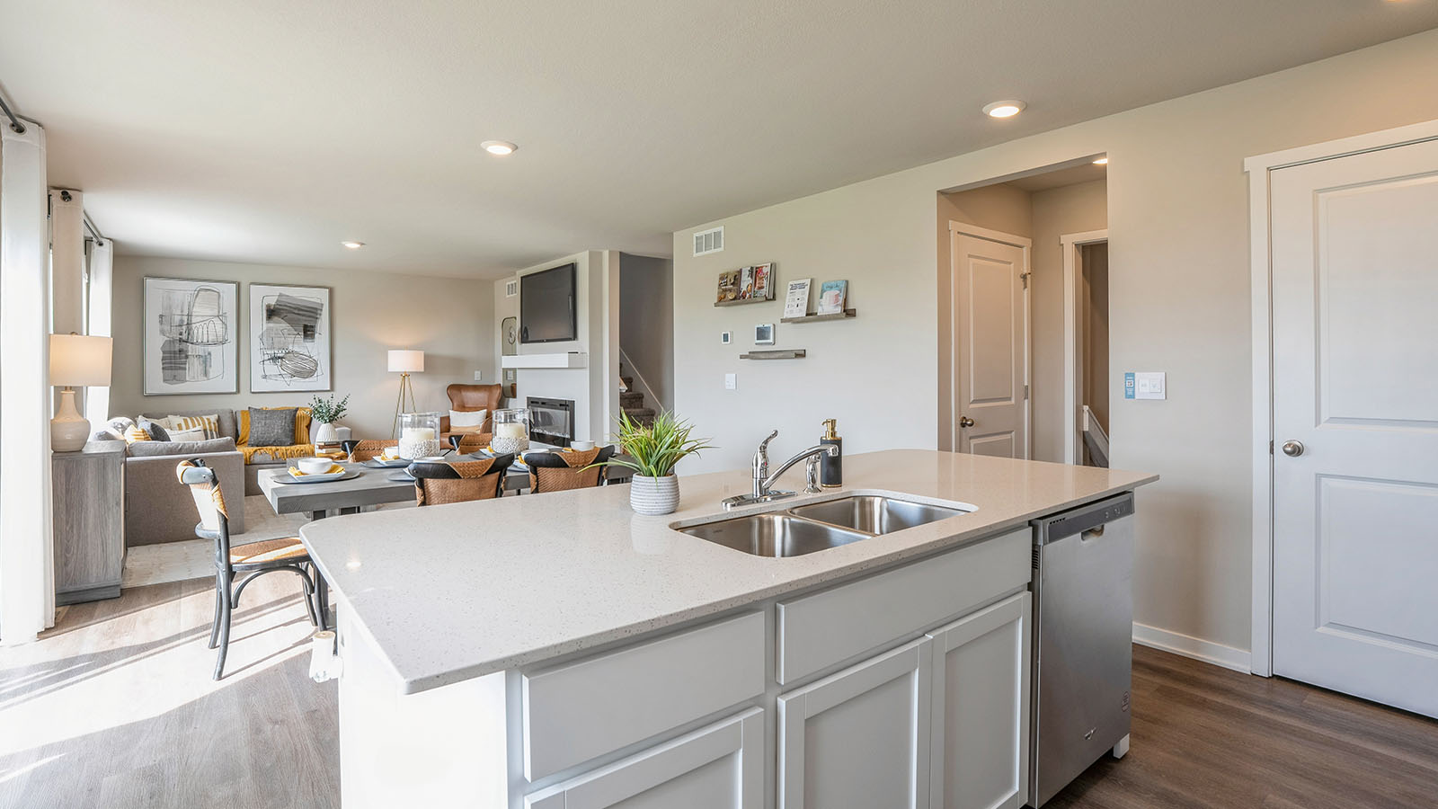 Kitchen island overlooking dining area and living room