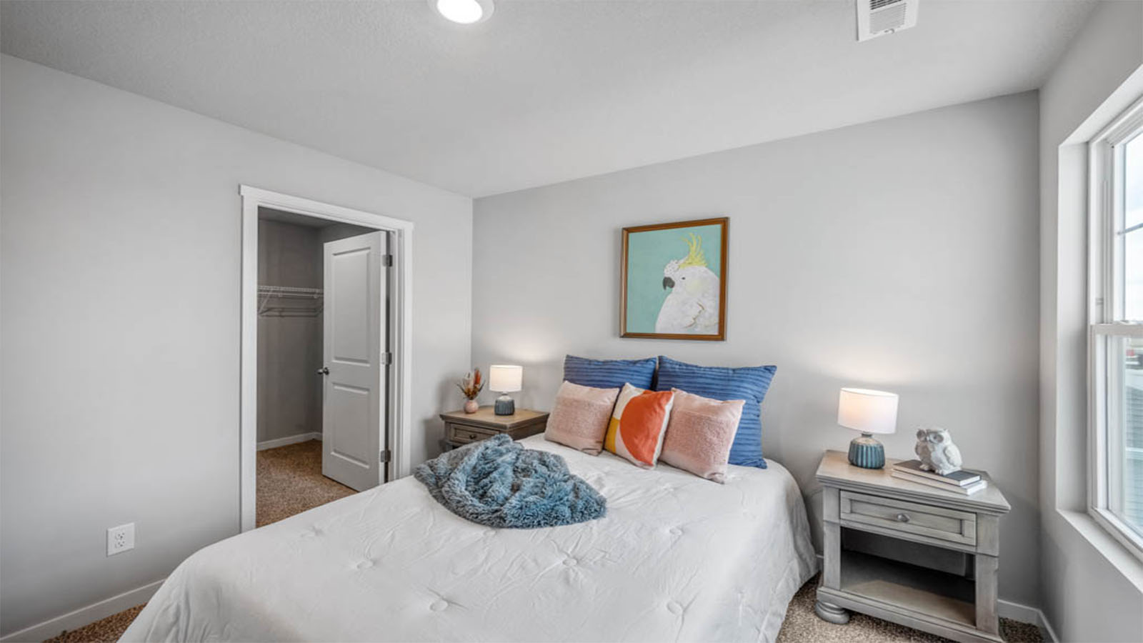 Second bedroom with overhead lighting
