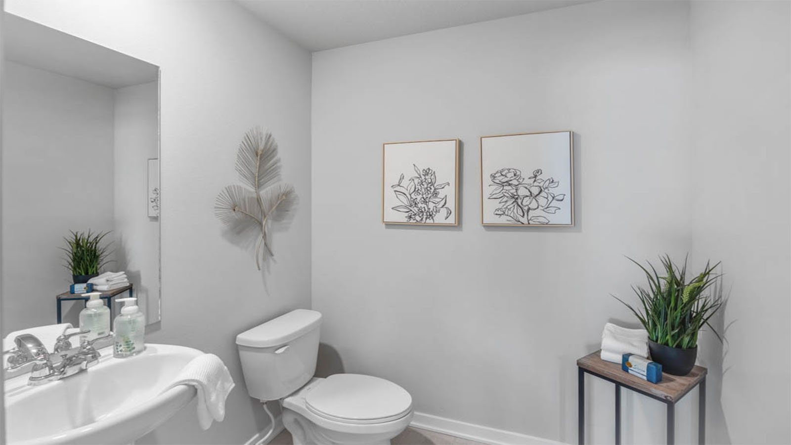 Half bathroom with mirror and sink