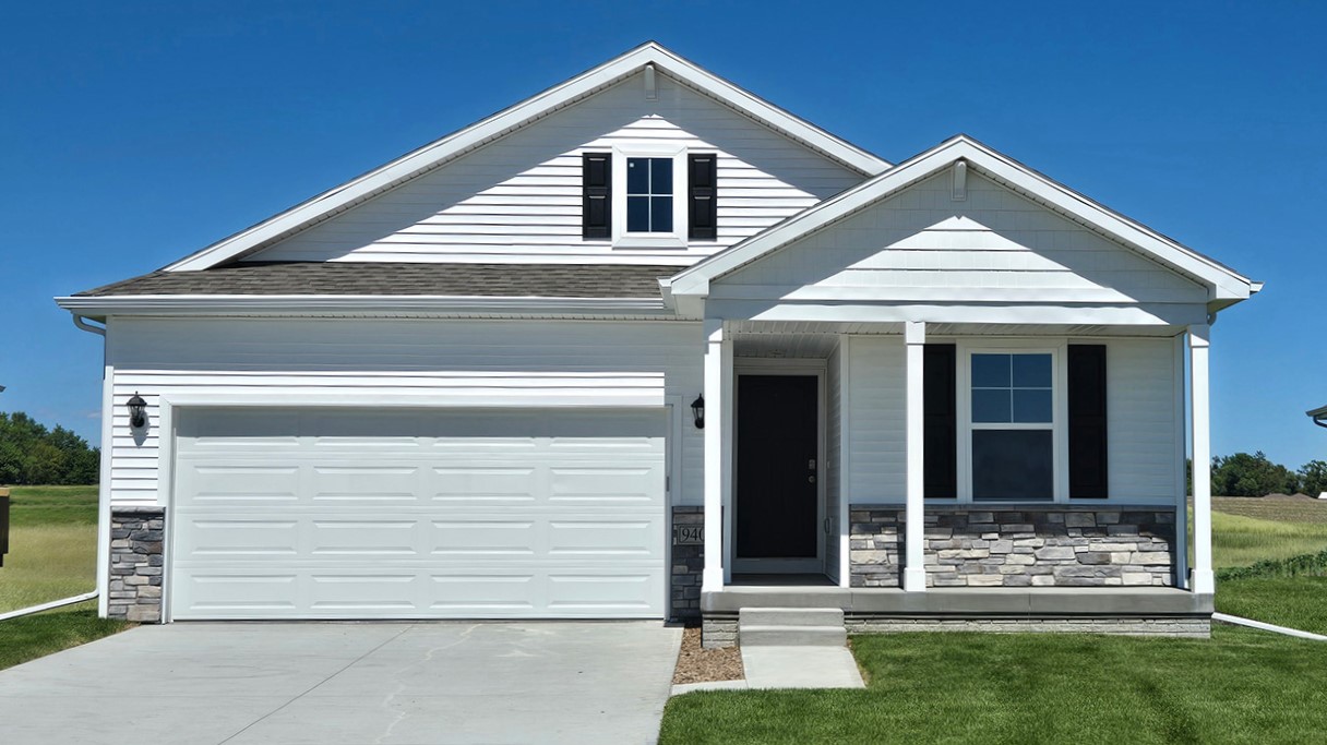 front exterior of white abbott home