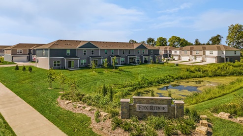 Monument sign in front of Fox Ridge townhome community