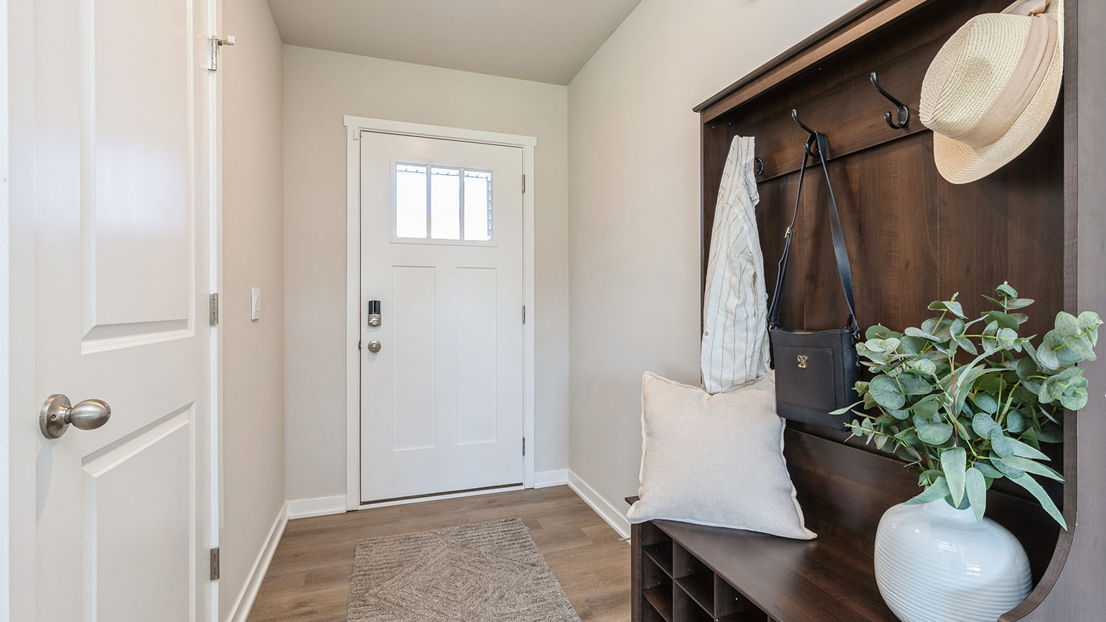 Front entryway showing front door and hall tree