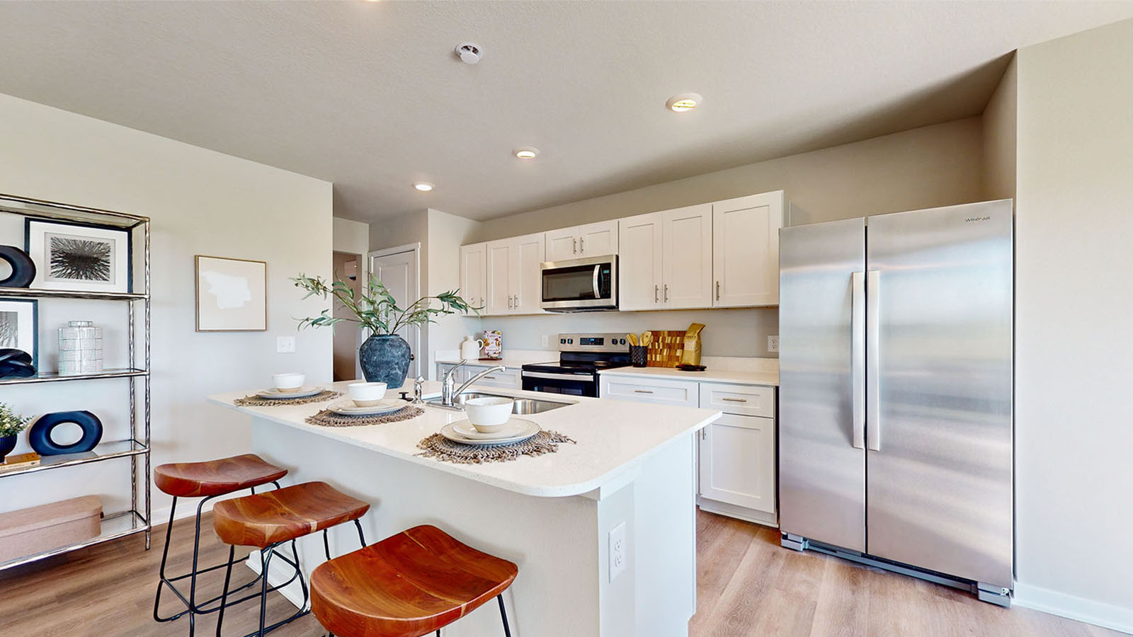 Kitchen with white cabinets and stainless-steel appliances