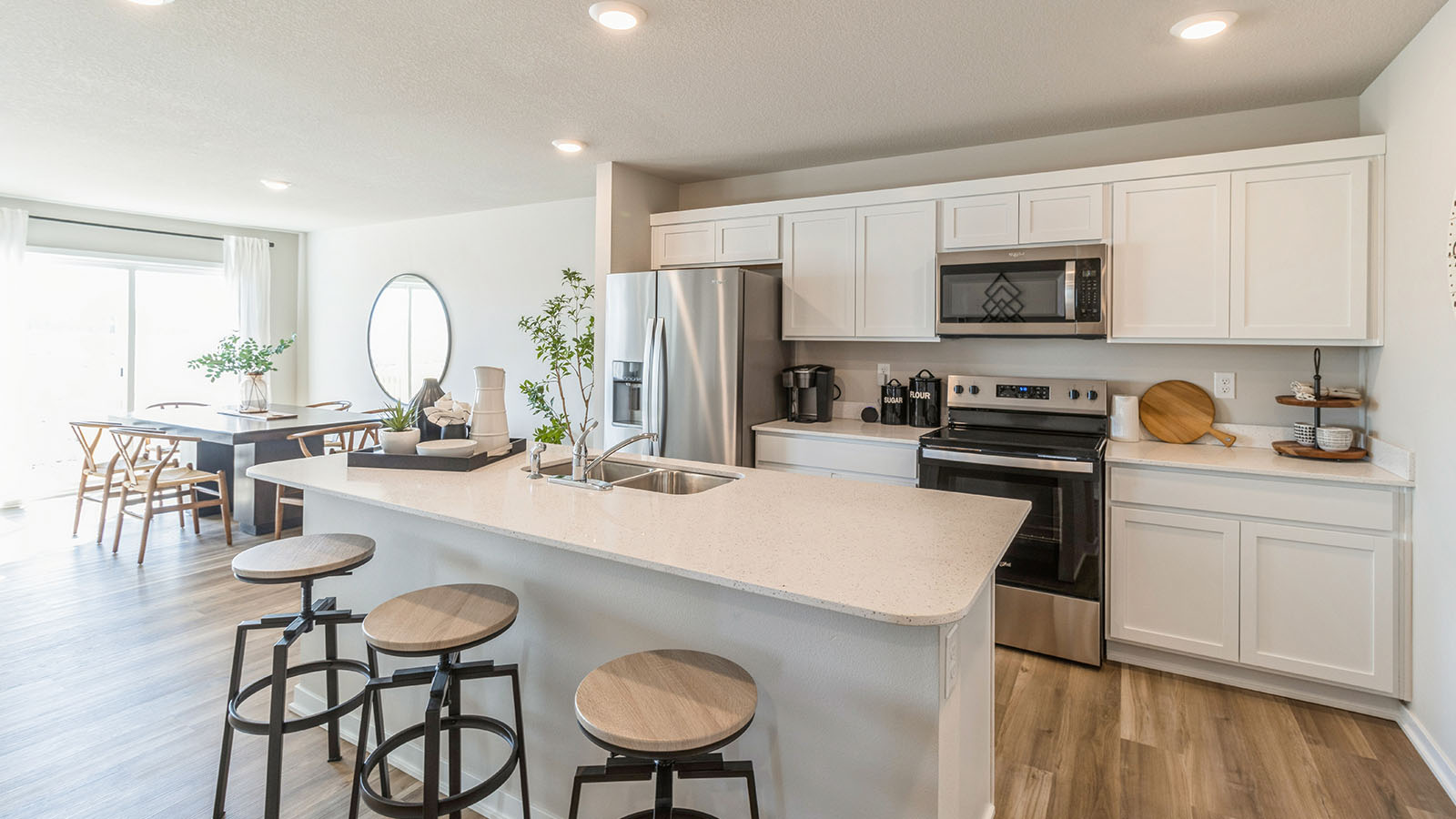 Main living space blends seamlessly from kitchen to living and dining room areas enjoying entertaining or everyday living.