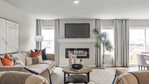 Living room with windows and electric fireplace