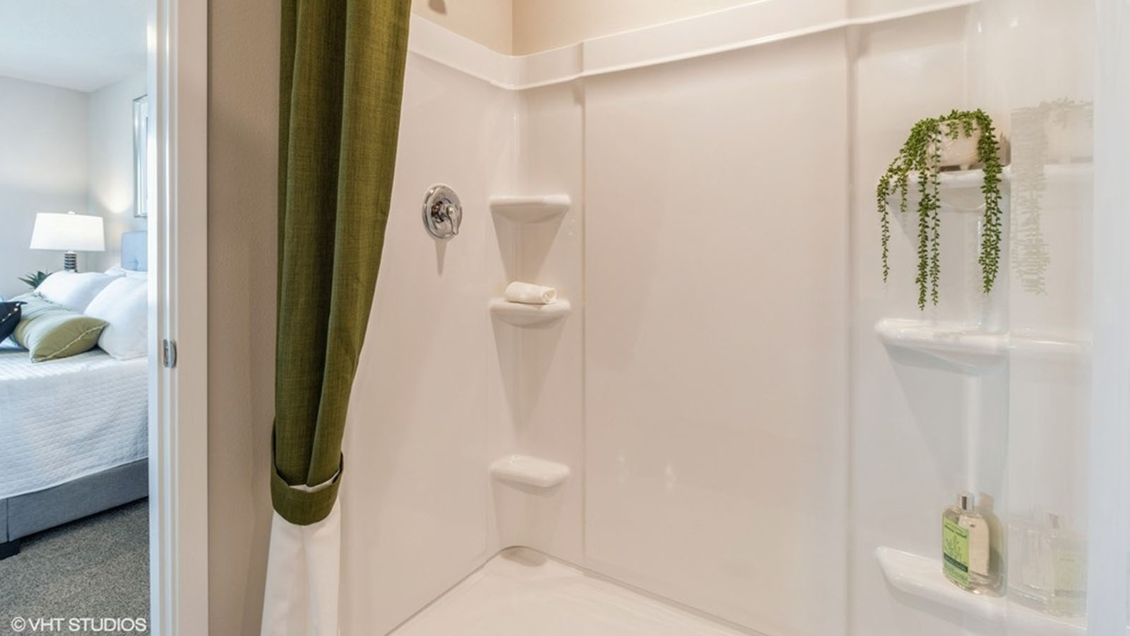 Walk in shower in the primary bathroom of the Hamilton