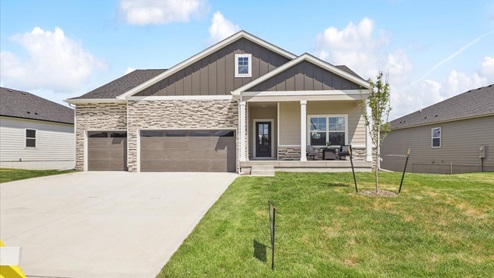 front exterior of the madison home with attached 3 car garage