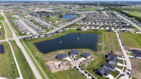 aerial view of horton series with large pond