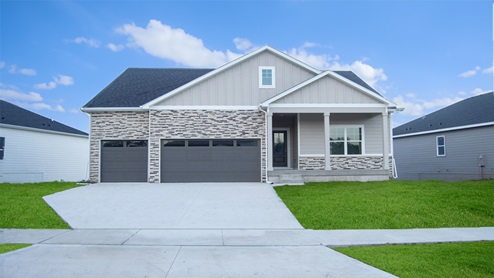 front exterior of the madison home with attached 3 car garage